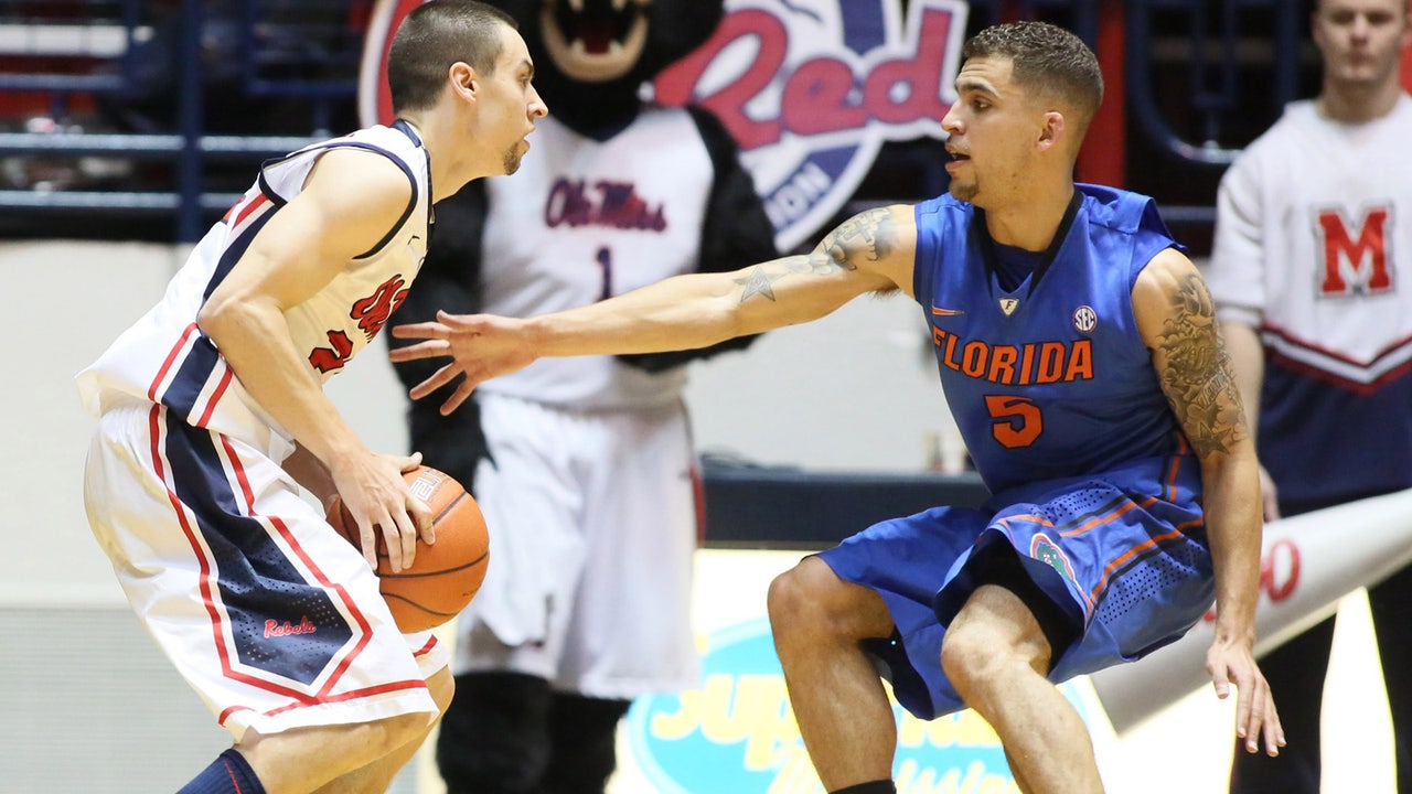 Gators blanket Henderson in second half, survive road scare